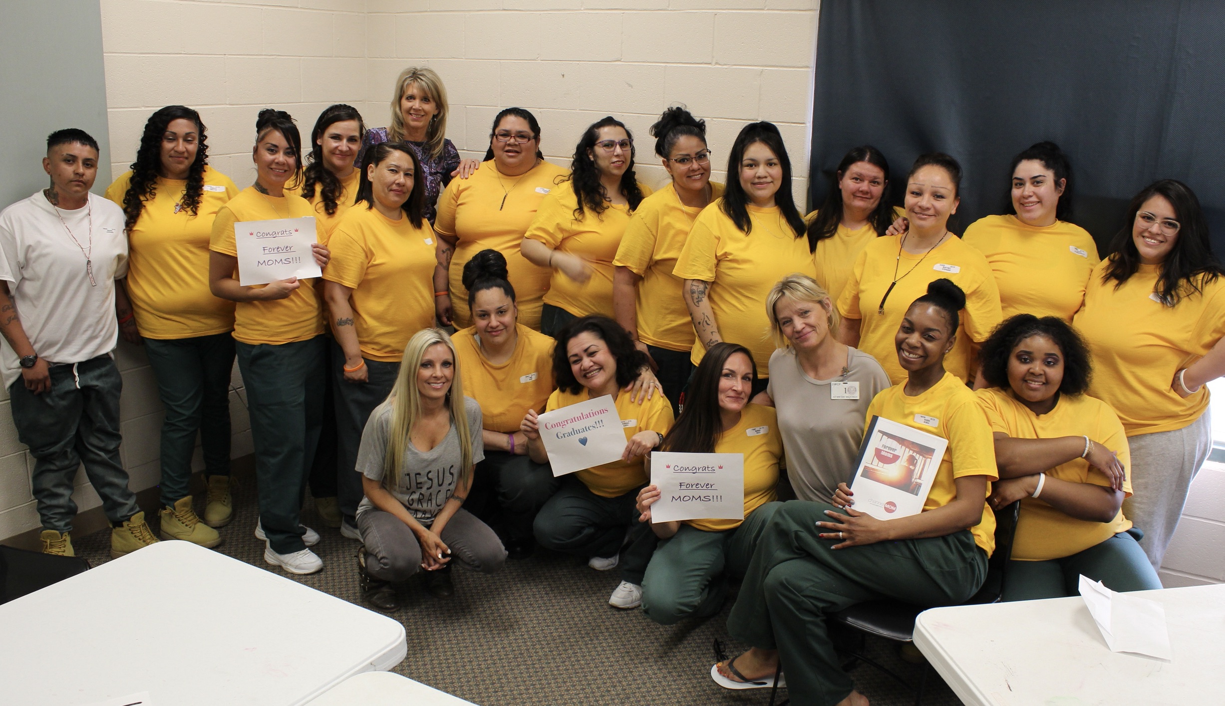 Group of women in prison grads of Forever Moms