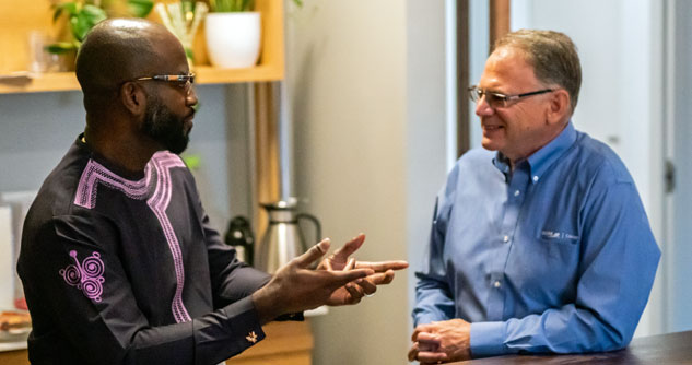 SCORE Chicago client Iyobasa Ero with mentor Steven Lome.