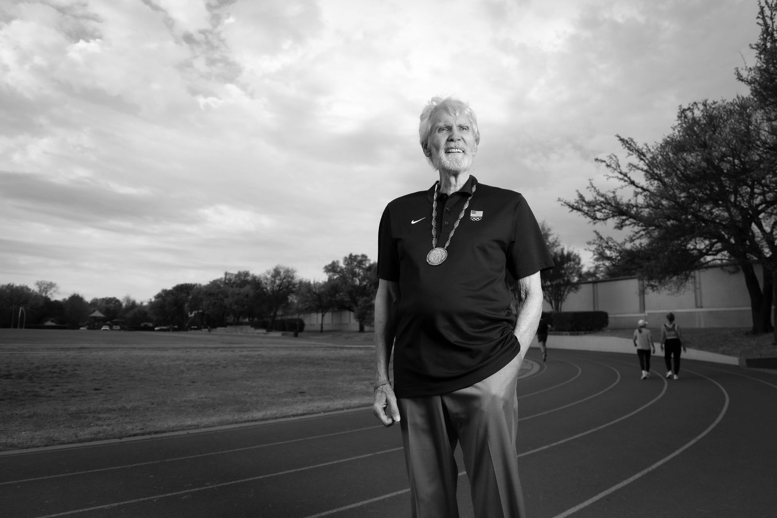 Earl Young Wearing His Gold Medal