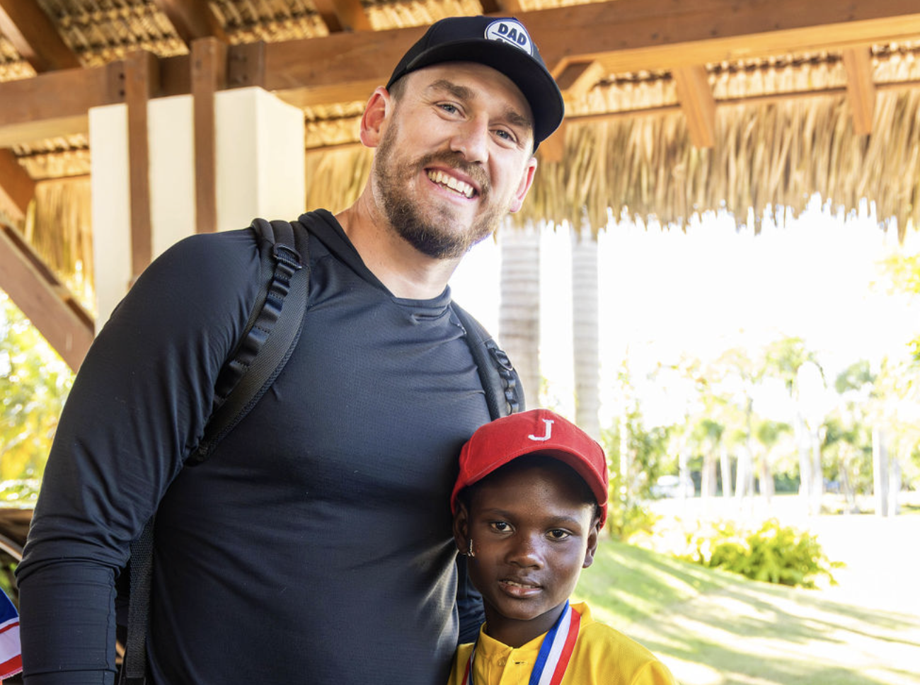 Man with child in the Dominican Republic