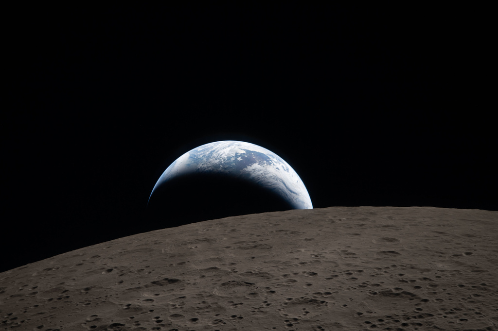 Artemis II crew captured this view of an Earthset on April 6, 2026, as they flew around the moon