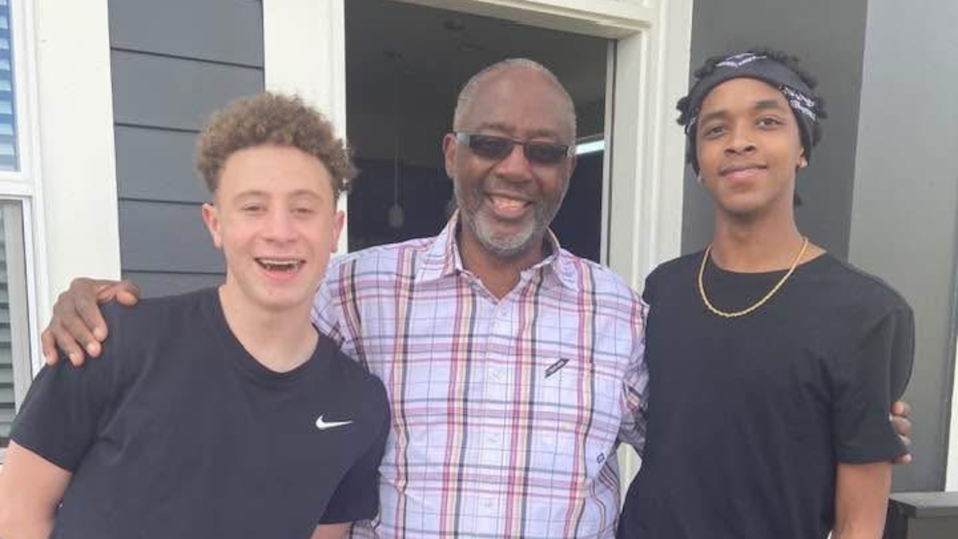 Sinclair (center) with two of his grandsons.