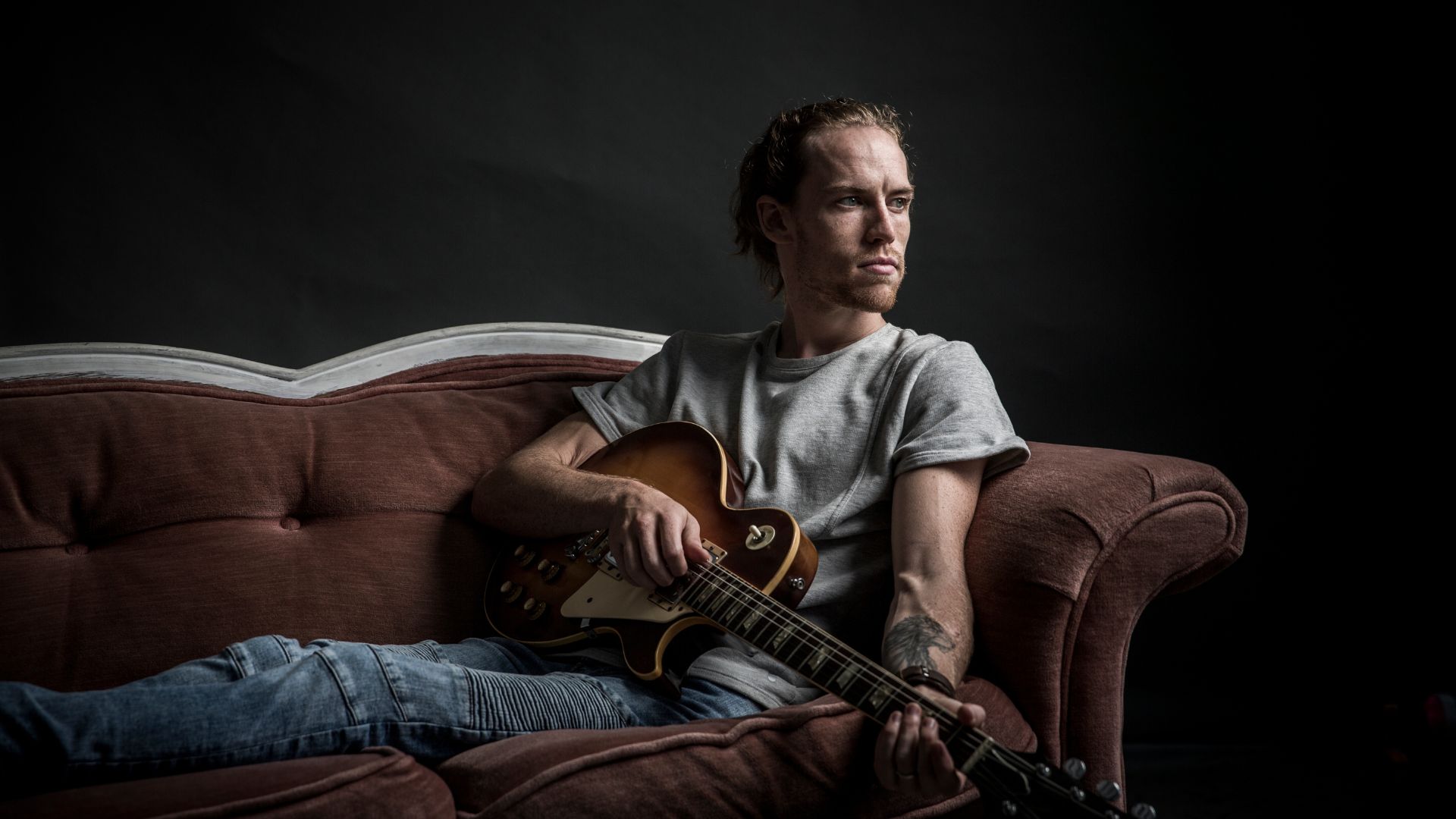 Looking toward the future, David Francisco holds the guitar that has become one of the many ways God uses his story to bring hope, healing, and encouragement to others.