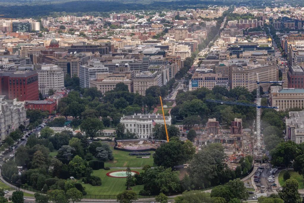 Construction continues on a helipad and the White House Ballroom on the South Lawn of the White House