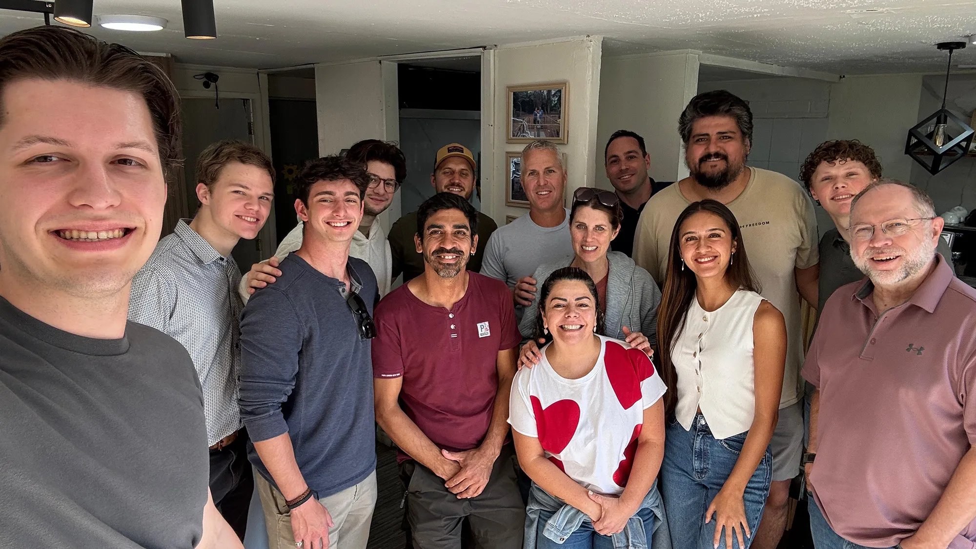 Hustle House members meeting with coffee shop owners in Chile who use their profits to fund the digging of wells in Sierra Leone.