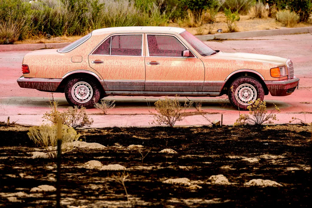 Fire retardant coats a vehicle following the Bug Fire near Reno, Nev.