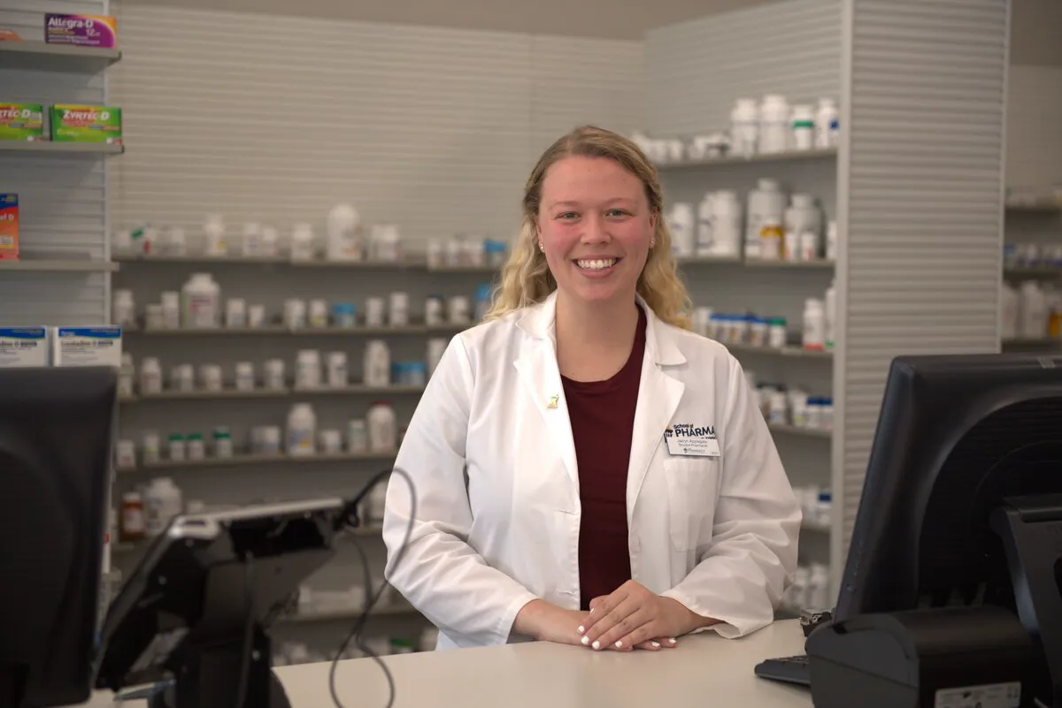 A recent Cedarville University pharmacy student receives practical clinical experience at a nearby pharmacy. All pharmacy students participate in clinical opportunities in the Doctor of Pharmacy program.