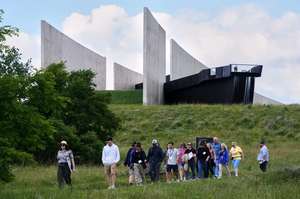 U.S. Park Ranger Claire Affinito, left, leads a tour for a group of educators at the Flight 93 National Memorial in Shanksville, Pa.