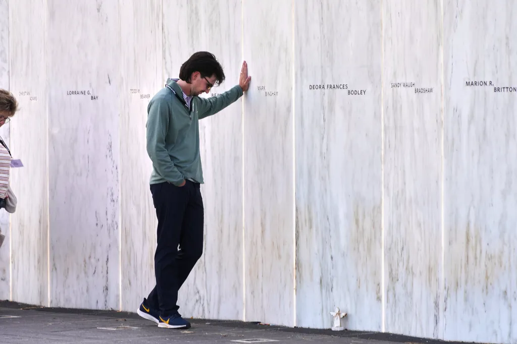 Social Studies teacher John Boston Bradley, who teaches at Bishop McCort High School in Johnstown, Pa., pauses at the Wall of Names during an educators seminar at the Flight 93 National Memorial in Shanksville, Pa.