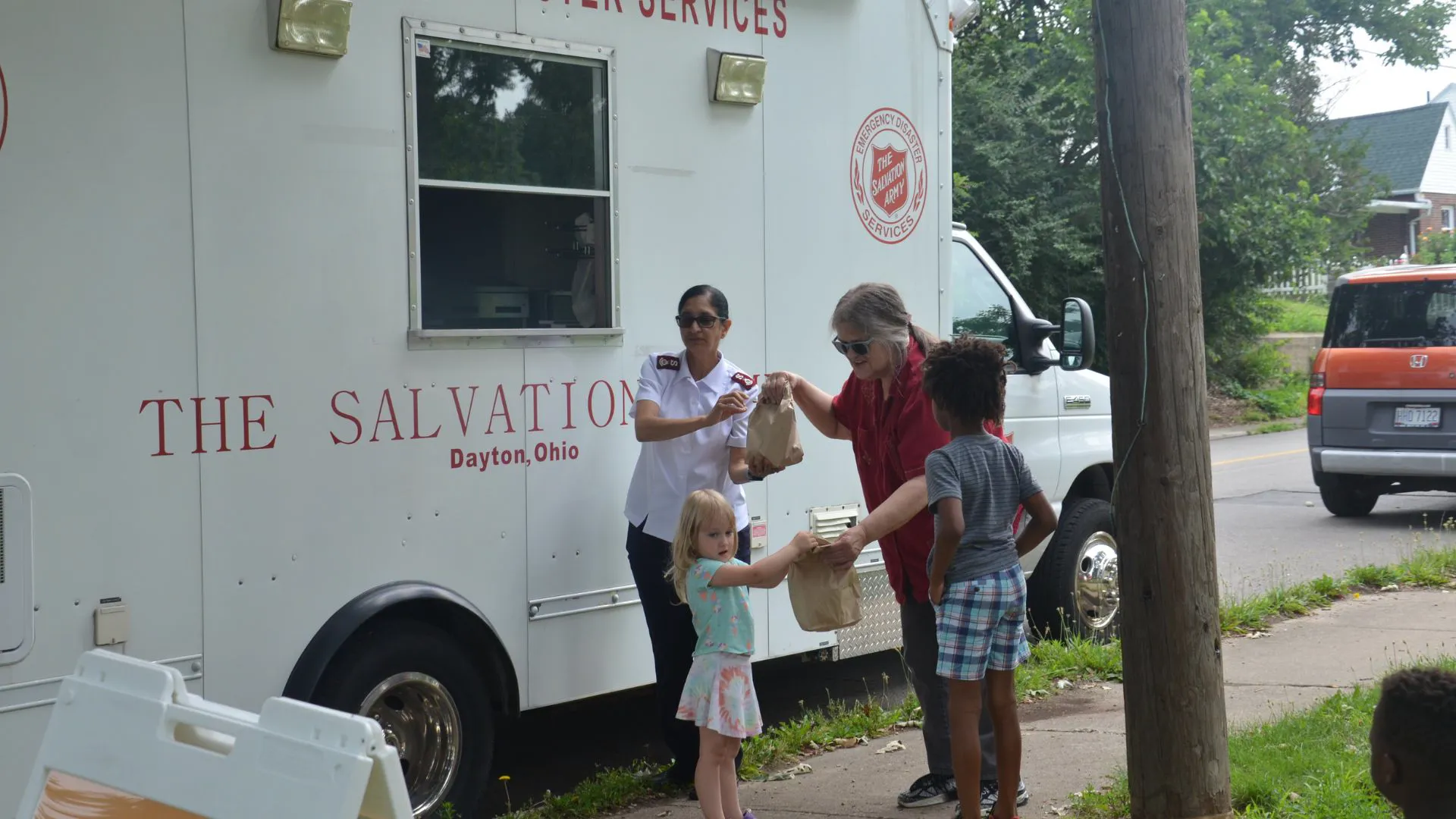 Major Martina Cornell serves an Ohio family during a Salvation Army service event.