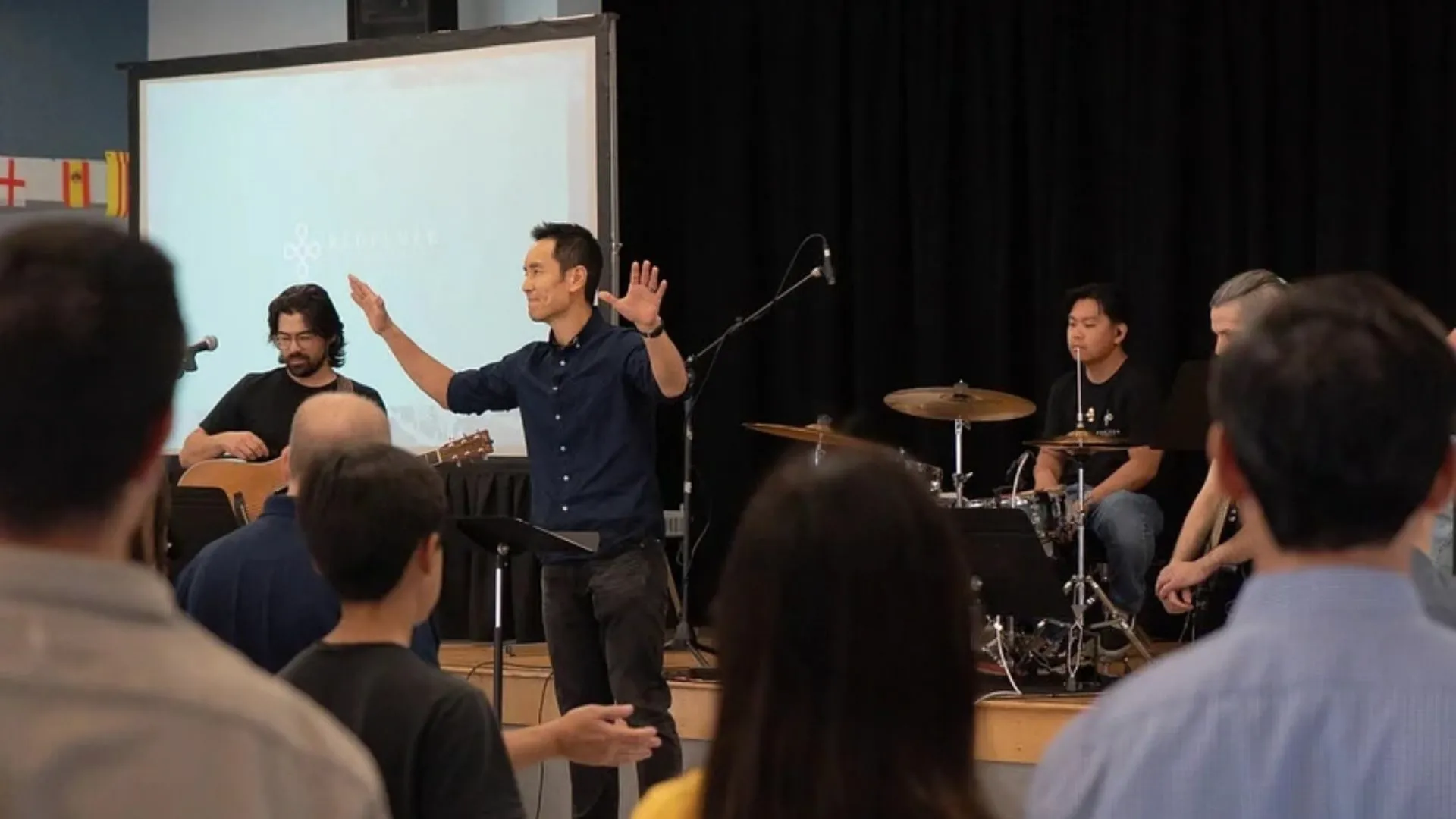 Pastor Peter Hwang gives the benediction at Redeemer Scripps Ranch
