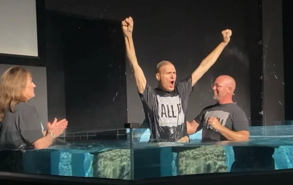 Lead Pastor Cody Walker celebrates a baptism at Hope City Church in Joplin, Missouri. 