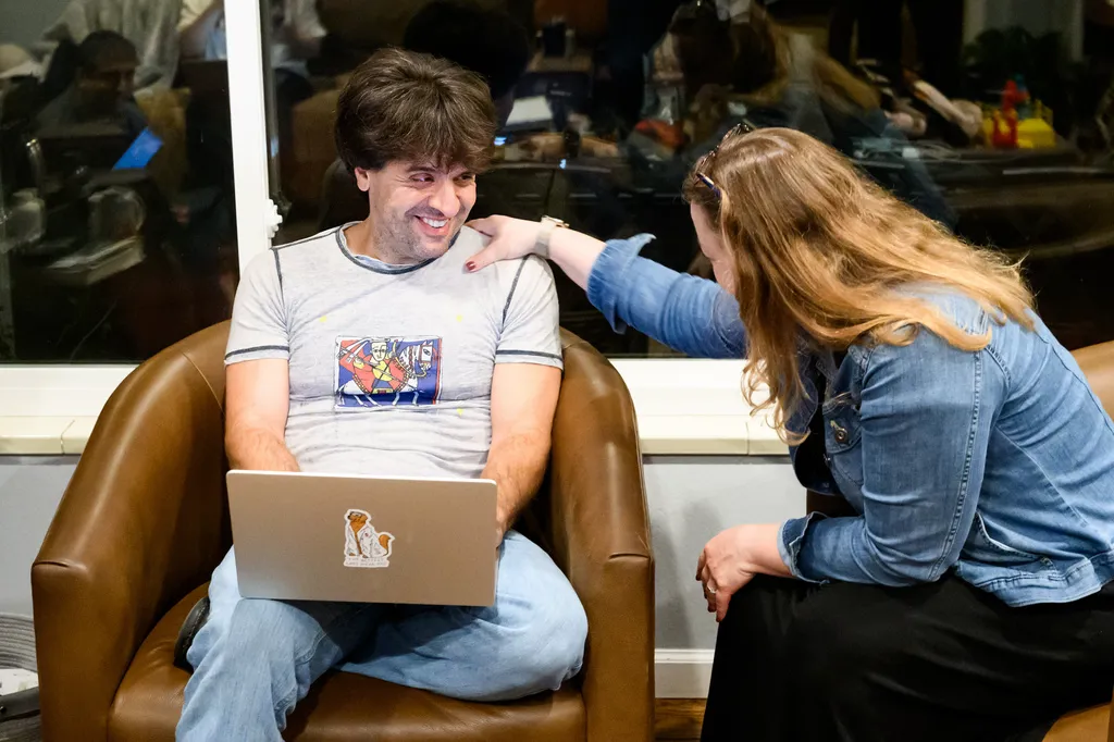Karl Deisseroth talks to his wife Michelle Monje-Deisseroth 