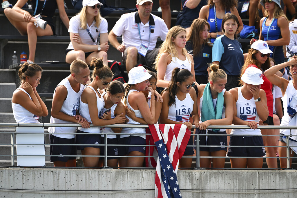 Fans and teammates react after Anita Alvarez of United States collapsed during the solo free final of the artistic swimming at the 19th FINA World Championships