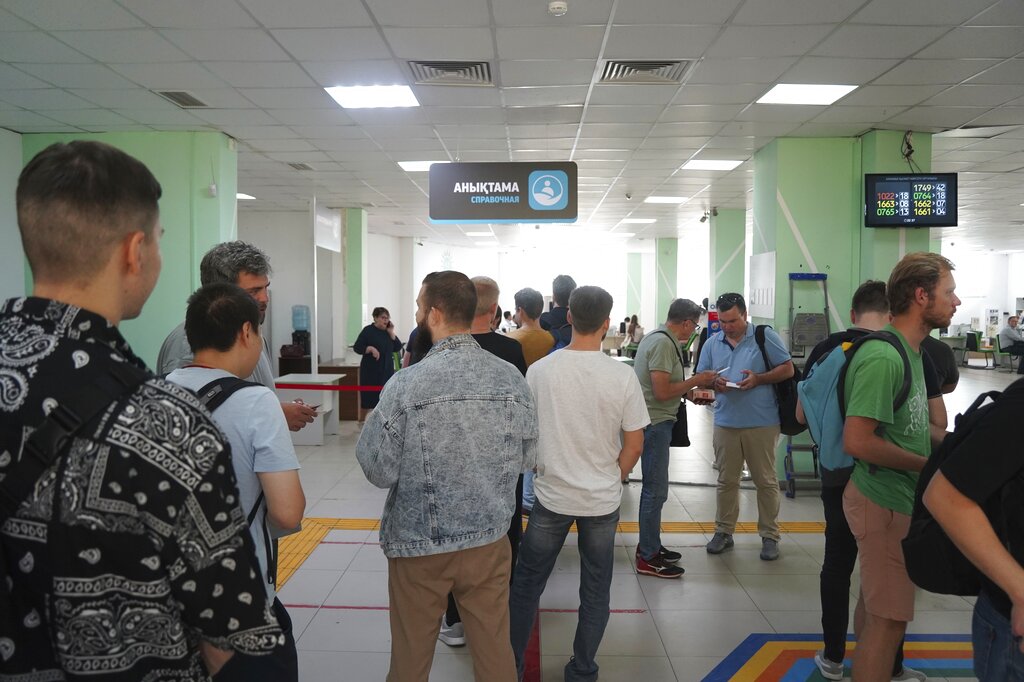 Russians lineup to get Kazakhstan