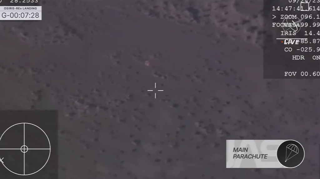 Capsule released by the Osiris-Rex spacecraft parachuting down to Earth