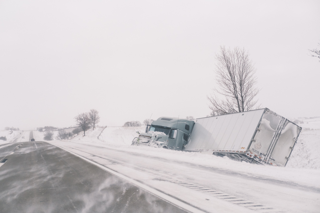 Crashed semi truck sits abandoned along Interstate 80 in central Iowa