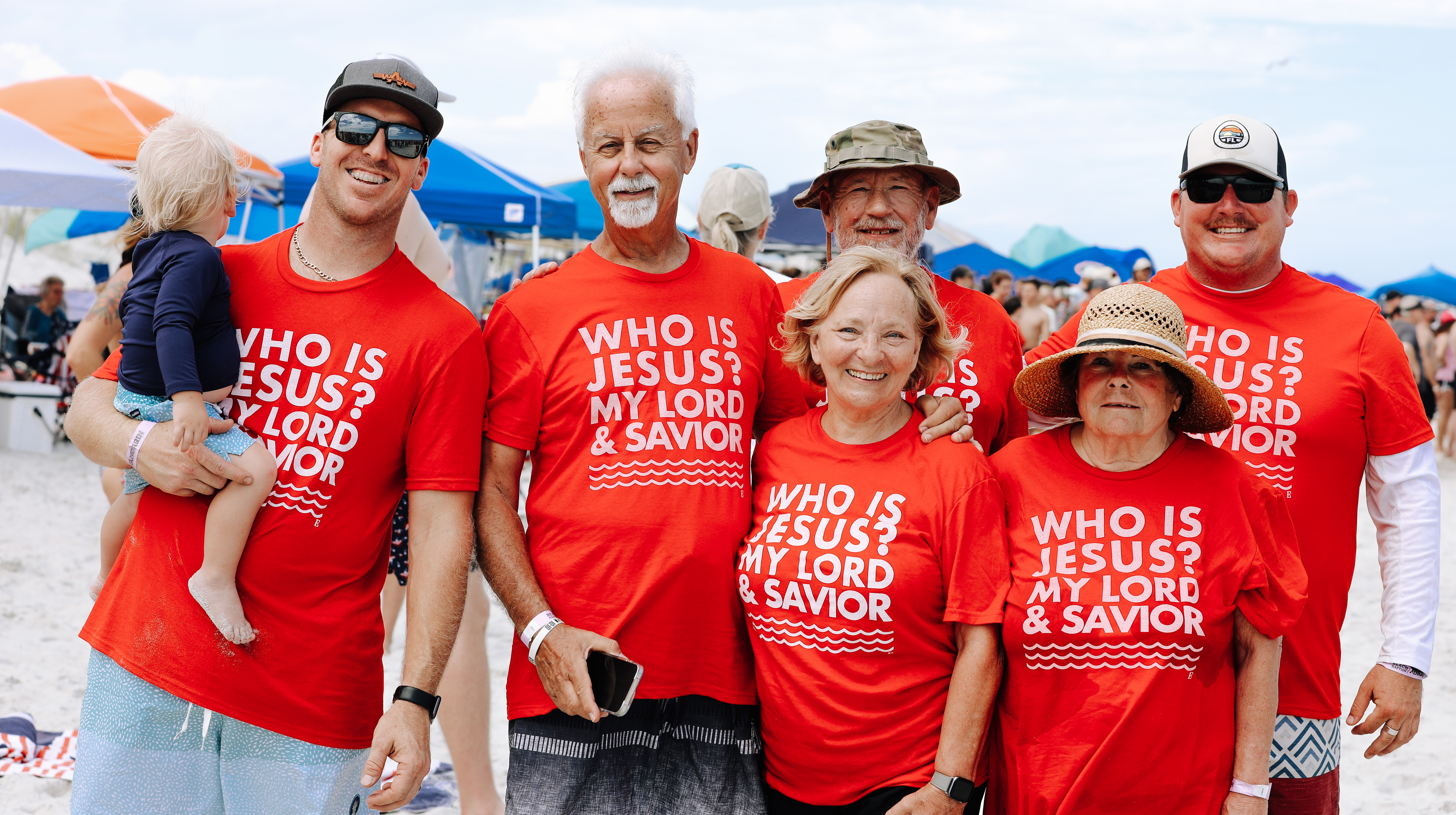 Family posing with red