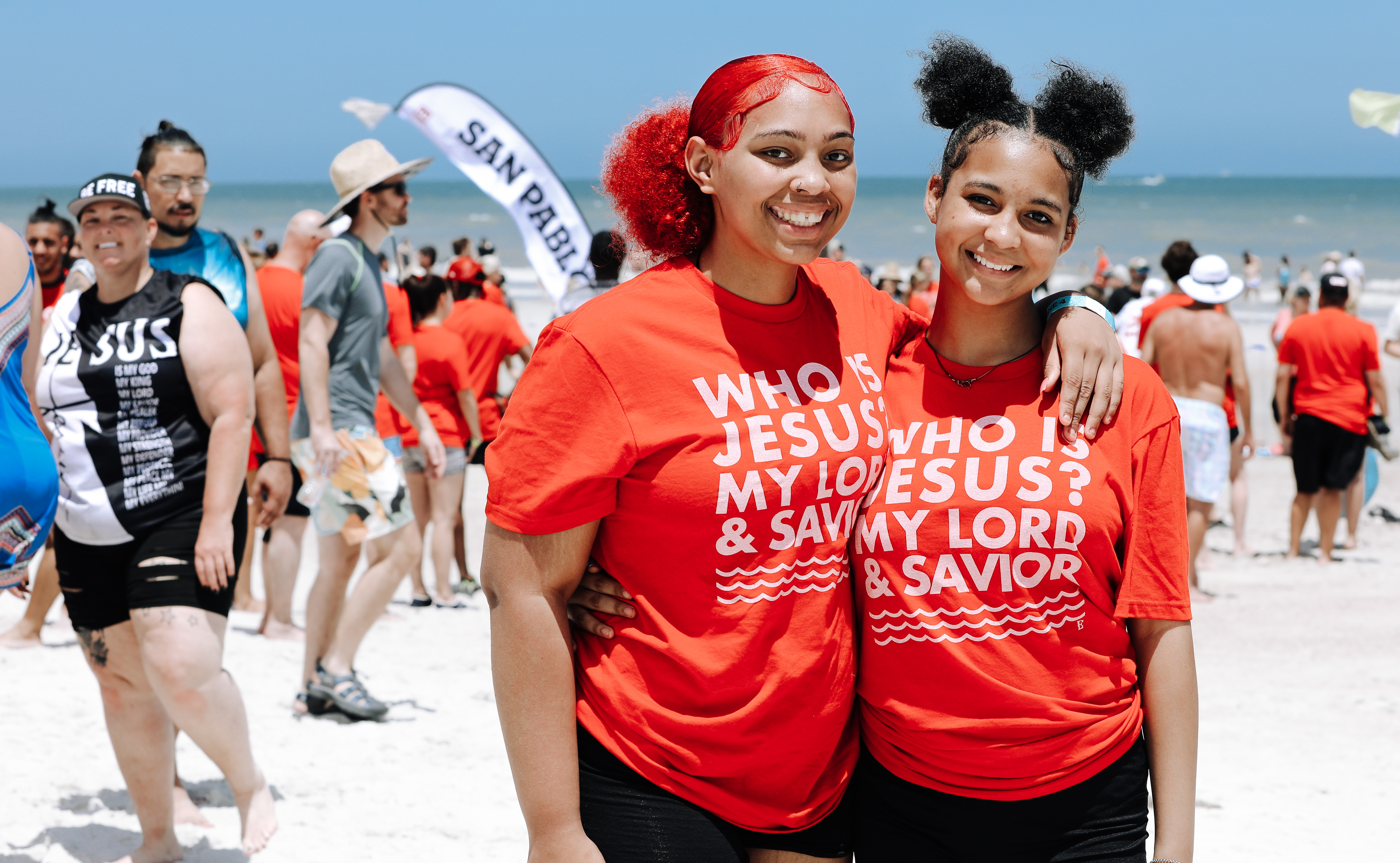 Two young women, smiling