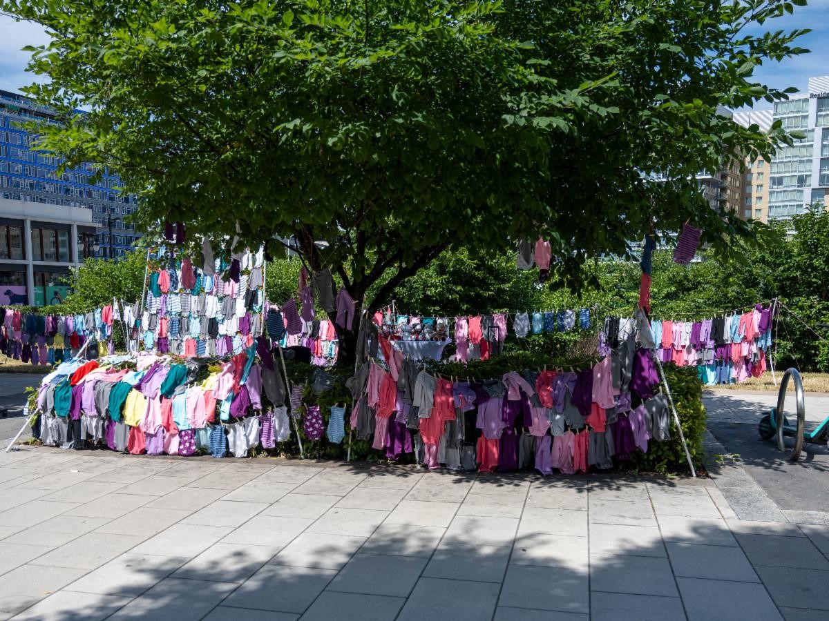 1,086 onesies were displayed across the street from the U.S. Department of Transportation building in Washington, DC