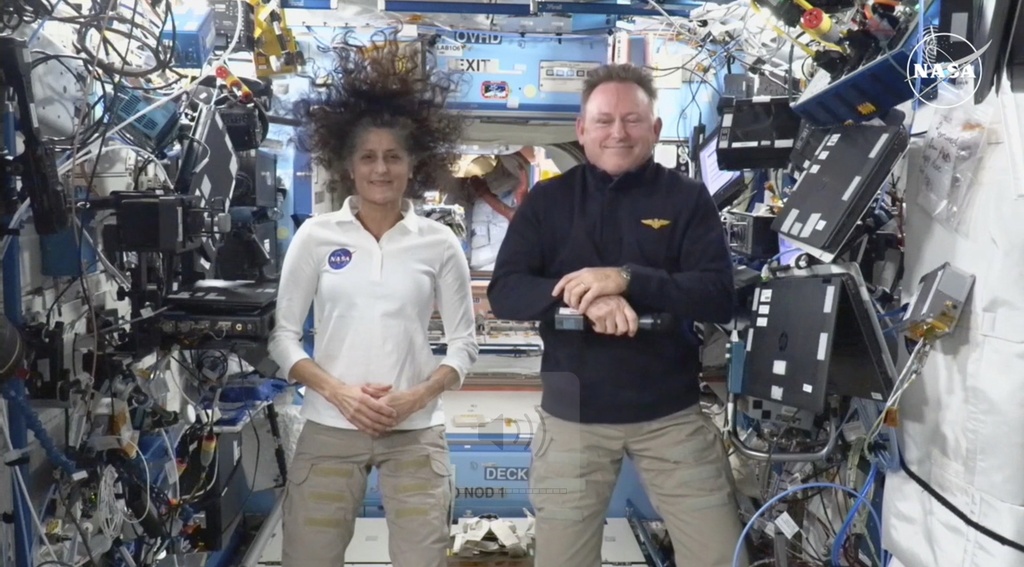 NASA astronauts Suni Williams and Butch Wilmore weightless on the International Space Station